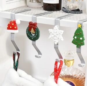 Juephe 4 Piece Christmas Metal Stocking Holders for the Mantel